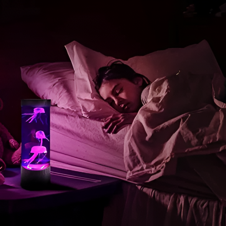 Unique LED jellyfish aquarium lamp, a calming sensory night light and innovative home decor gift.