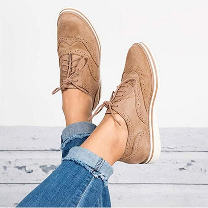 Carisse women's brown suede Derby shoes with traditional brogue perforations, ideal for versatile styling.
