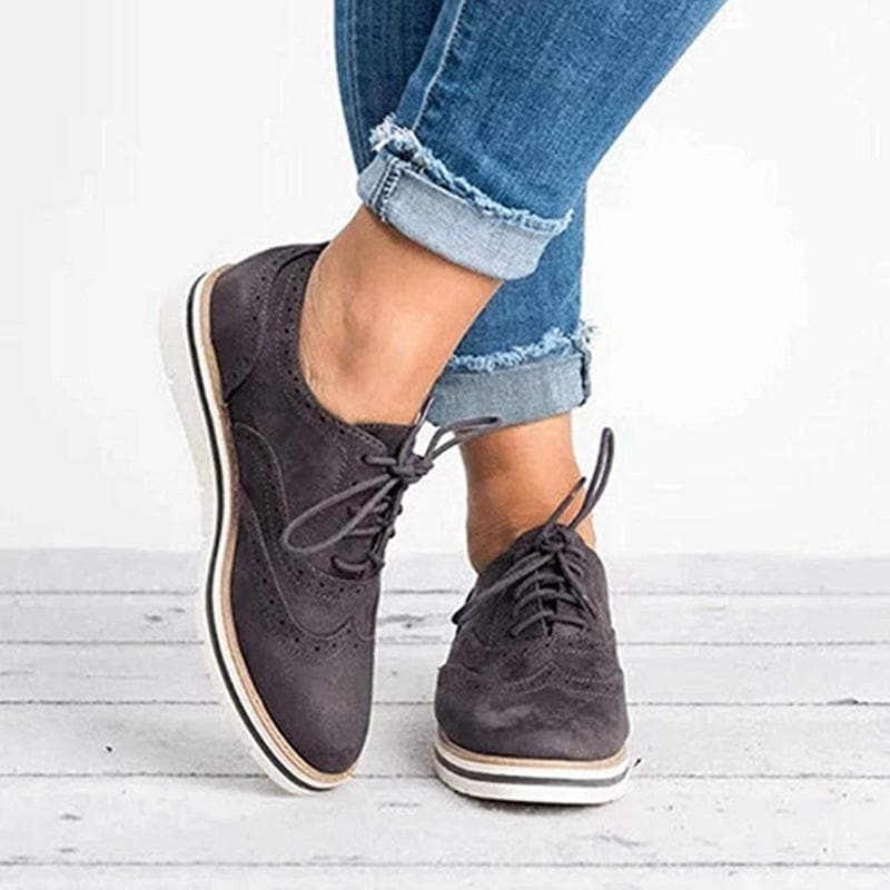 Formal women's Carisse suede Derby shoes with brogue pattern, suitable for professional or dressy occasions.