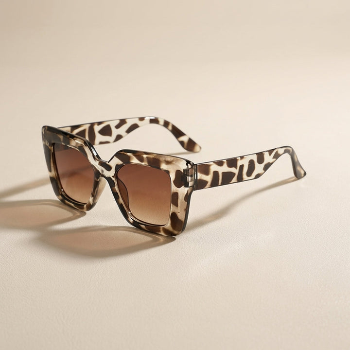 Carlotta Women's Square Sunglasses with chic frame. Fashion eyewear for stylish eye protection.