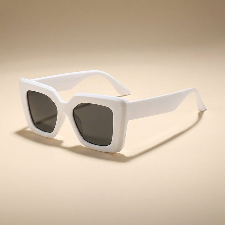 Black grey Carlotta square fashion sunglasses for women. Chic eyewear offering stylish eye protection.