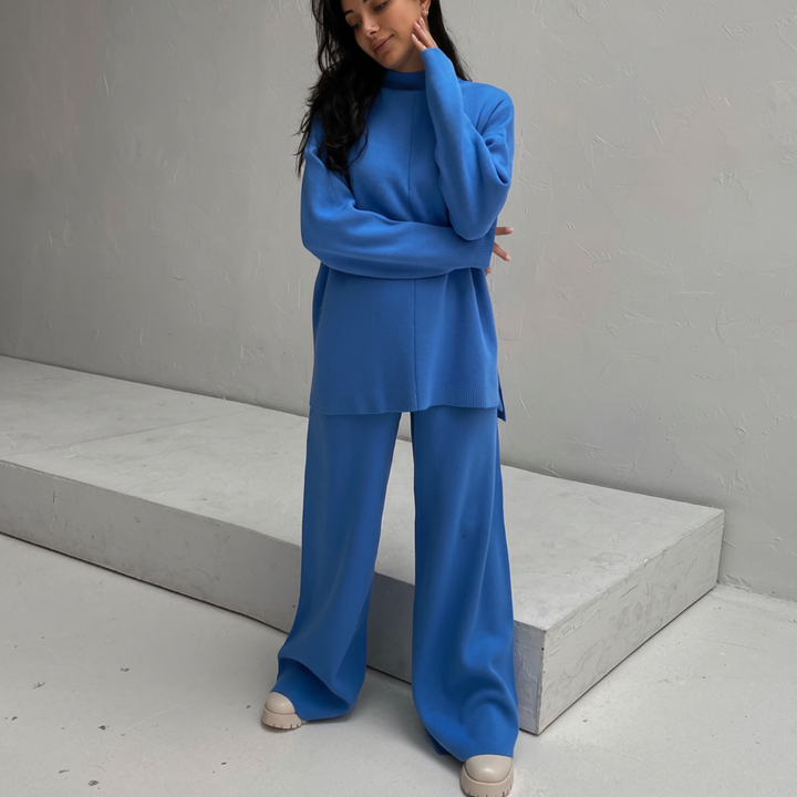 Women's two-piece knit lounge set with long-sleeve top and comfortable wide-leg trousers, perfect for winter.