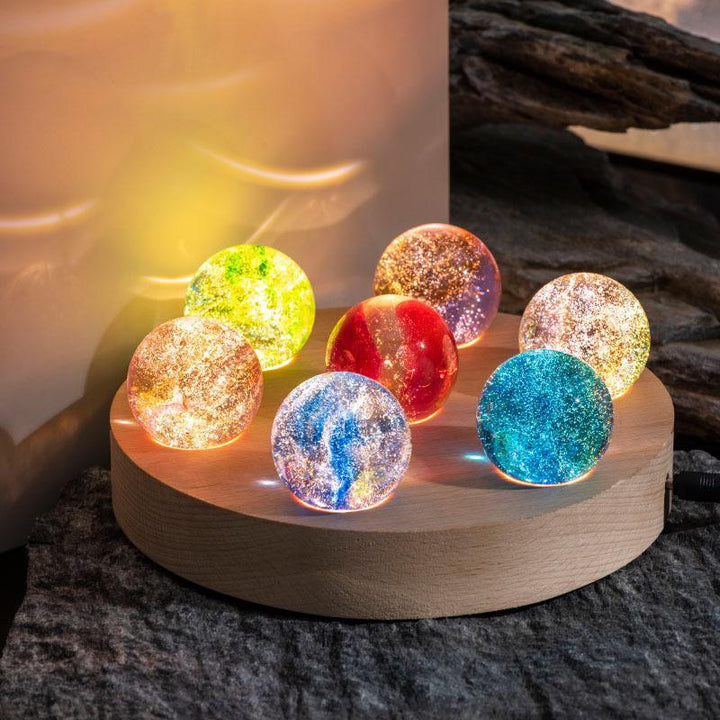 Collection of AstroGlow Orbs in various sizes, cosmic decor, crystal spheres with LED base