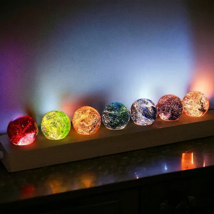 Detail of the LED base illuminating a Celestial Galaxy Crystal Orb, space themed night light