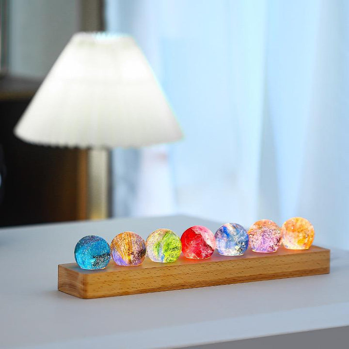 AstroGlow Orb casting a beautiful glow in a dark room, ideal for cosmic home accent