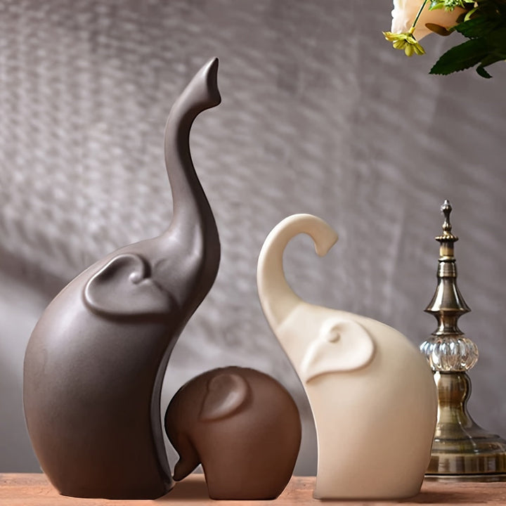 Minimalist ceramic elephant trio sculpture for modern home decor, elegant family design.