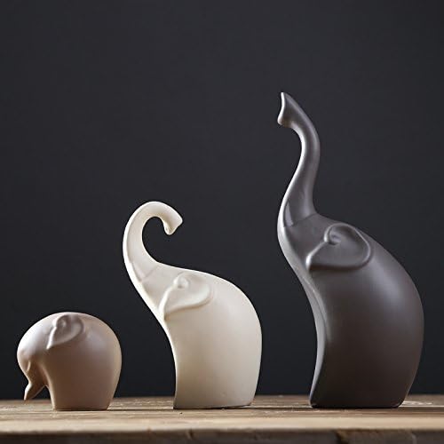 Loving ceramic elephant family statues, perfect for minimalist home decor & heartwarming display.
