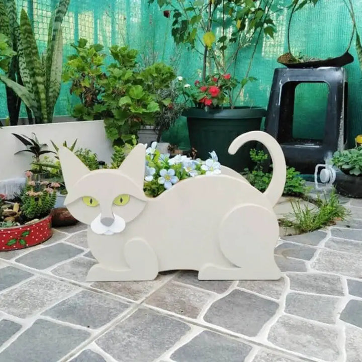 Adorable cat-shaped garden planter, ideal for unique outdoor plant displays & DIY projects.