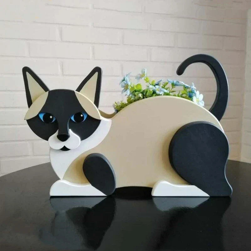 Unique cat-shaped garden planter, a whimsical backyard accent for outdoor DIY decor.
