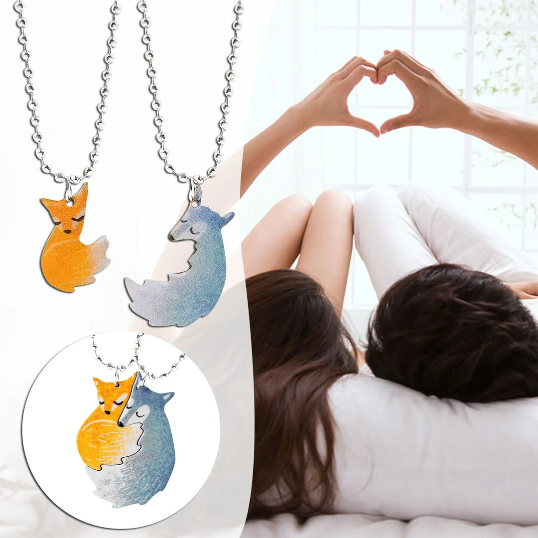 Charming fox & wolf couple necklace, silver tone, symbolizing unity & love. Animal jewelry gift.