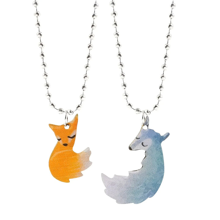 Artistic fox & wolf pendant necklace, high-quality animal jewelry, symbolizing love & partnership.