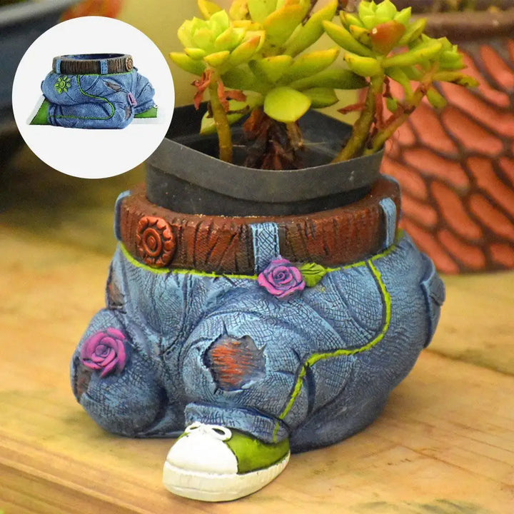 Hand-painted resin gardener statue planter, ideal for indoor succulent plants on a desk or shelf.