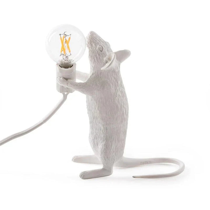 Charming playful white resin mouse LED table lamp, perfect for kids room decor or novelty lighting.