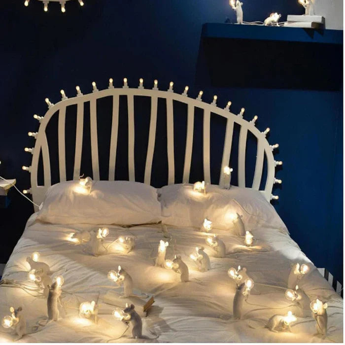 Detailed view of a gold resin mouse LED table lamp, a high-quality animal lamp with soft illumination.