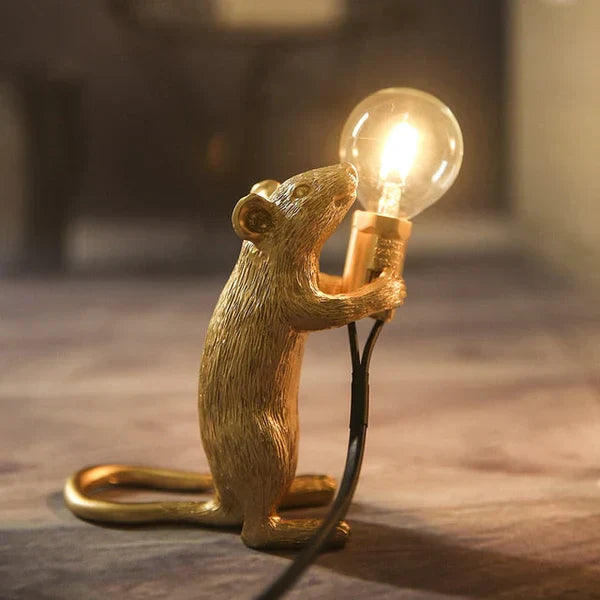 Resin mouse LED table lamp in white, a delightful novelty lighting fixture for a cozy atmosphere.