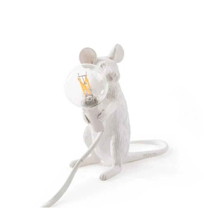 Detailed gold resin mouse LED table lamp peeking over a bulb, unique animal lamp for home decor.