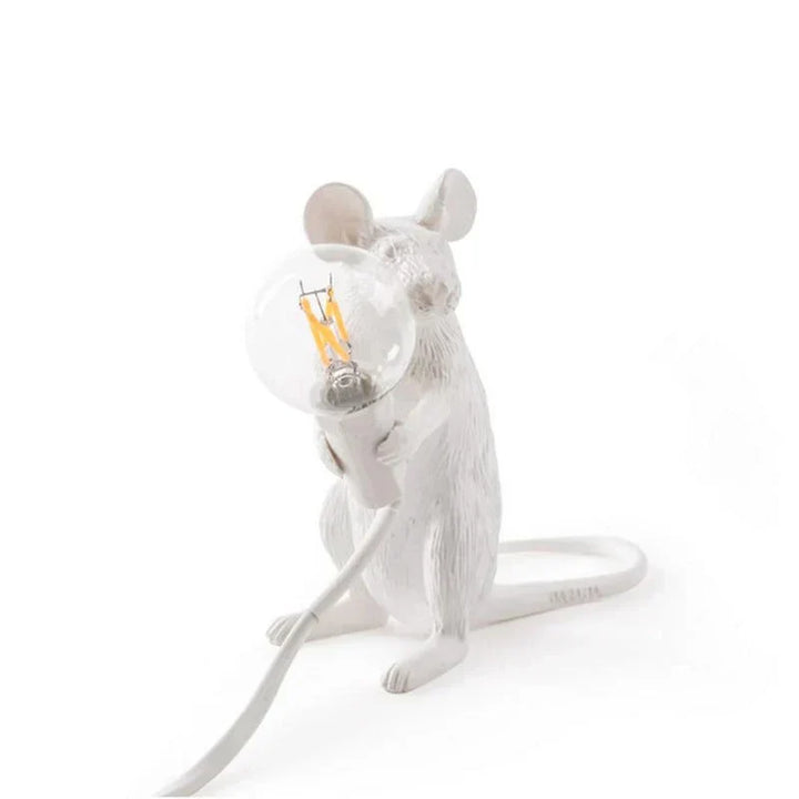Detailed gold resin mouse LED table lamp peeking over a bulb, unique animal lamp for home decor.