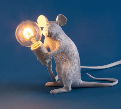 White resin mouse LED table lamp, adding a touch of playful charm to a modern interior.