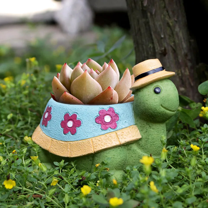 Decorative turtle planter pot for garden decor. Ideal as a succulent planter on patios, balconies, or indoors. TurtleBloom.