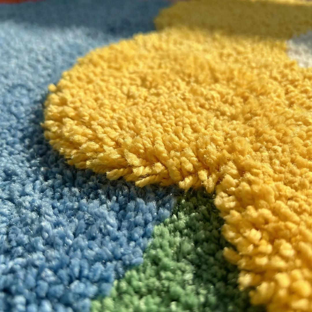 Soft floral meadow area rug. Whimsical wave pattern adds playful decor to living room or bedroom floors.