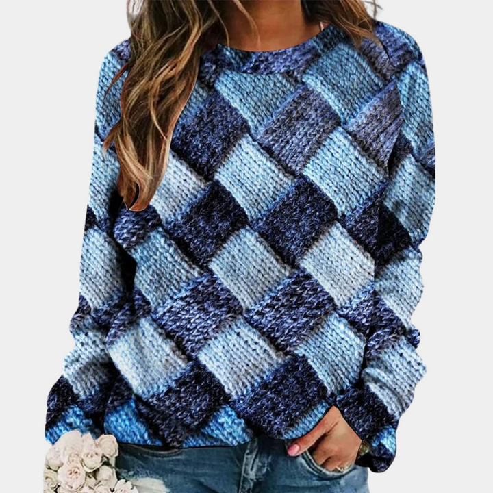 Cozy women's long-sleeve knit sweater. Versatile, colorful top for layering & chic everyday comfort.