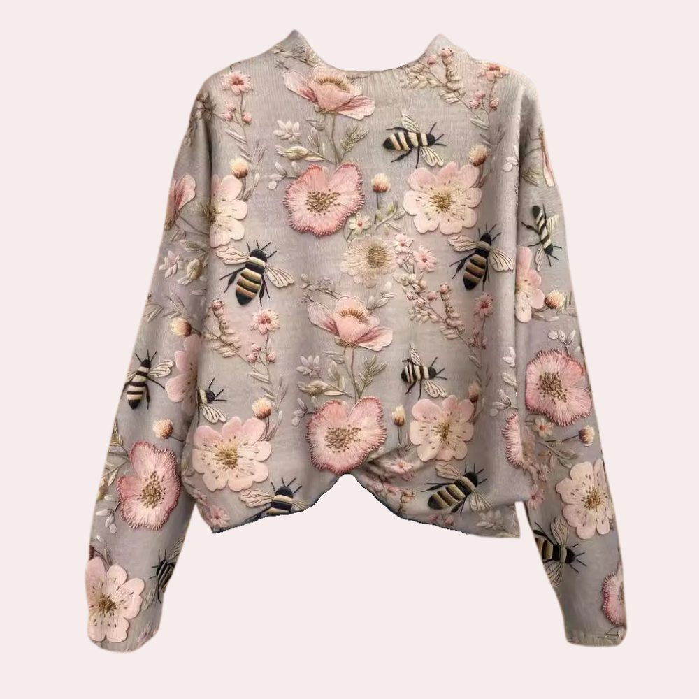 Stylish pink women's floral print sweater, versatile for casual wear & autumn fashion.