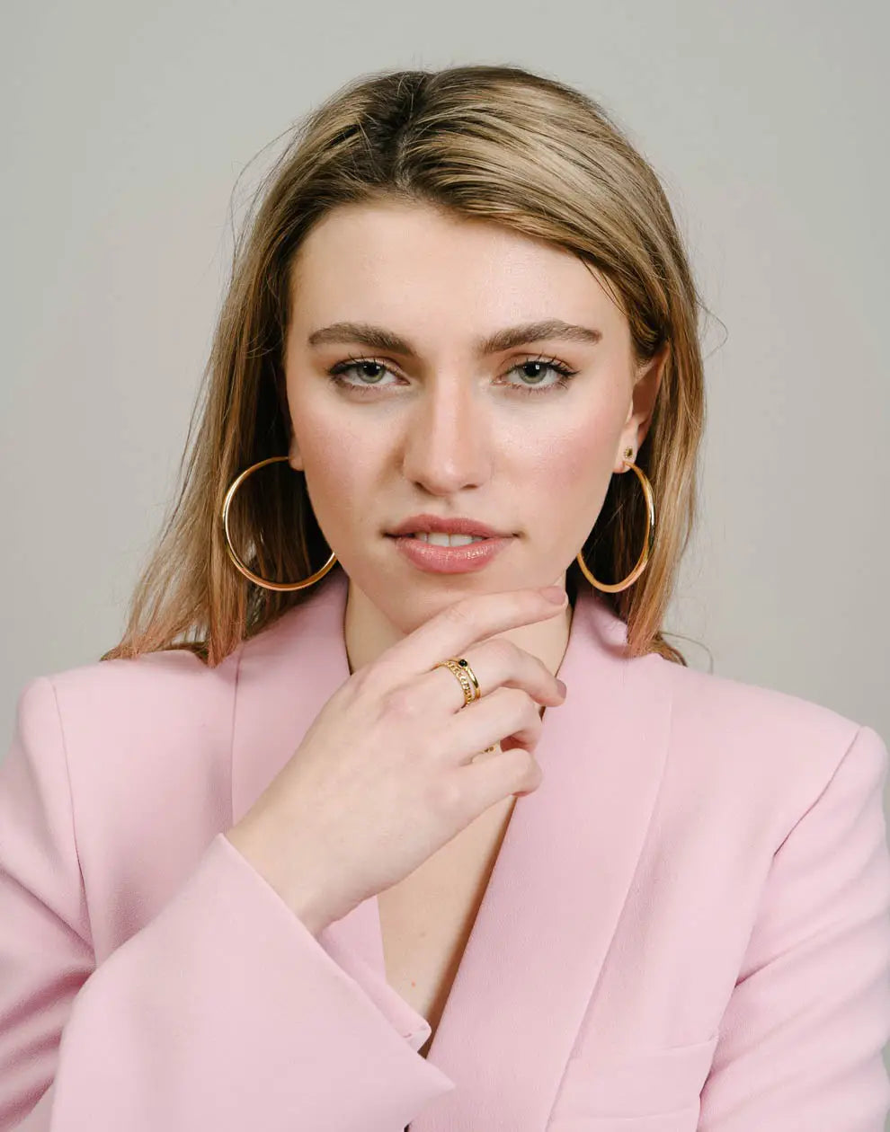 Elegant 2.36-inch gold-plated hoop earrings with secure lever back. Hypoallergenic women's fashion jewelry.
