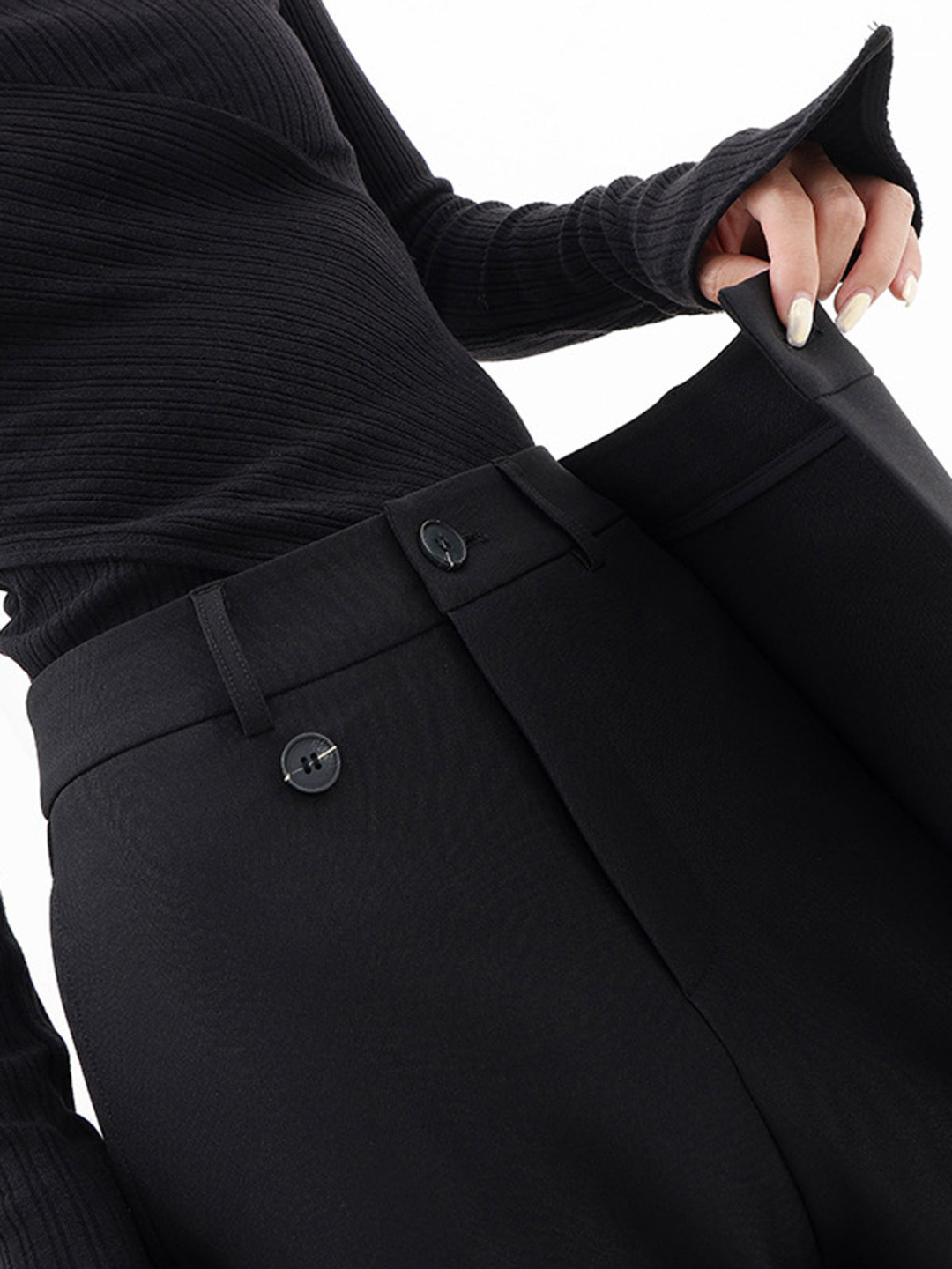 Contemporary women's baggy trousers, asymmetrical and stylish, offering a comfortable, modern fit.