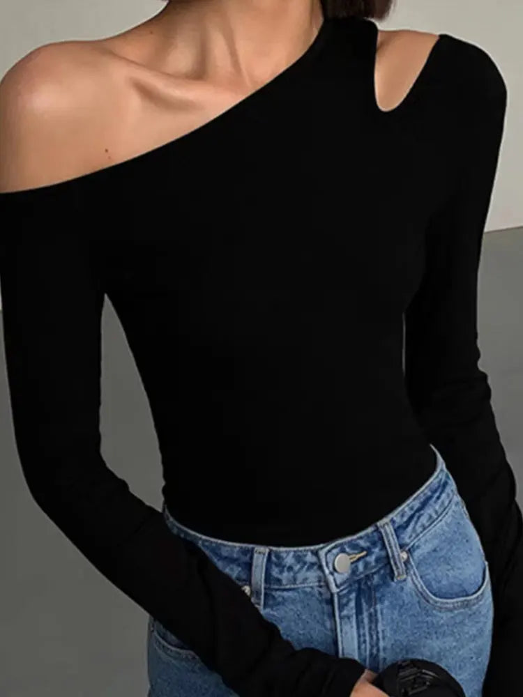 Versatile women's black off-shoulder long sleeve top. Chic style for everyday fashion & comfort.
