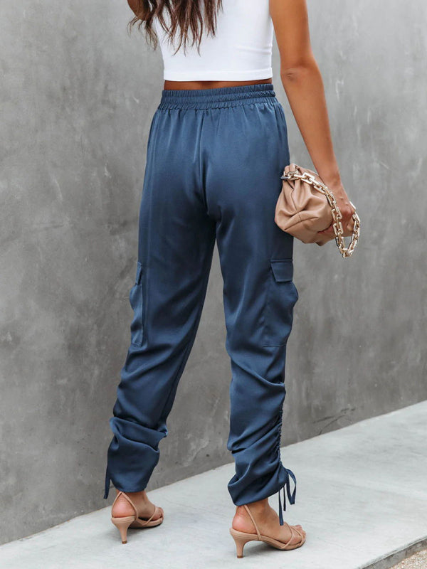 Elegant red satin cargo trousers, perfect women's pants for an effortlessly stylish and modern look.