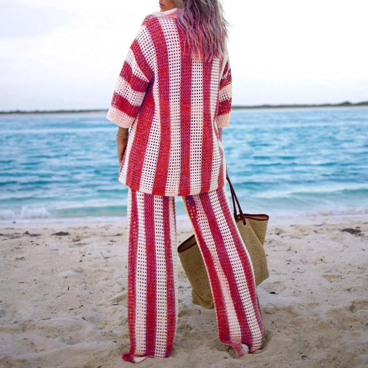 Women's chic striped knit bohemian two-piece set, featuring a cropped top & flowy skirt for summer.
