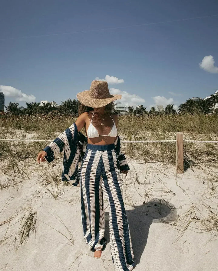 Fashionable women's striped bohemian knit two-piece summer set, a chic and comfy vacation outfit.
