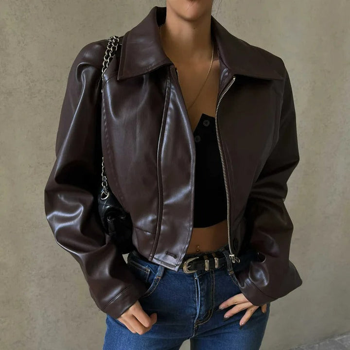 Chic brown PU leather women's summer jacket with a stylish notched collar and zip details, perfect for a tailored look.