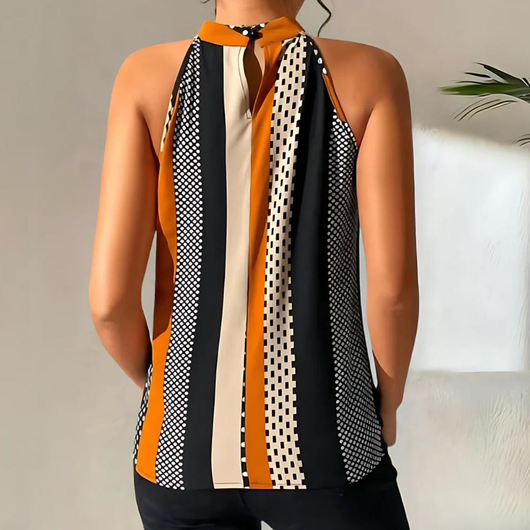 Elegant women's sleeveless top in a trendy design, offering comfortable and versatile everyday style for ladies apparel.
