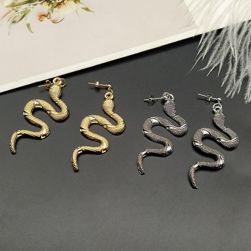 Exquisite crystal snake earrings, a sparkling women's statement piece of serpent jewelry.