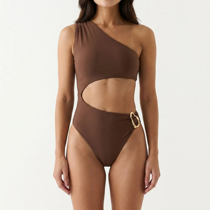 Women's asymmetrical one-shoulder monokini, stylish cut-out beachwear for vacation fashion.
