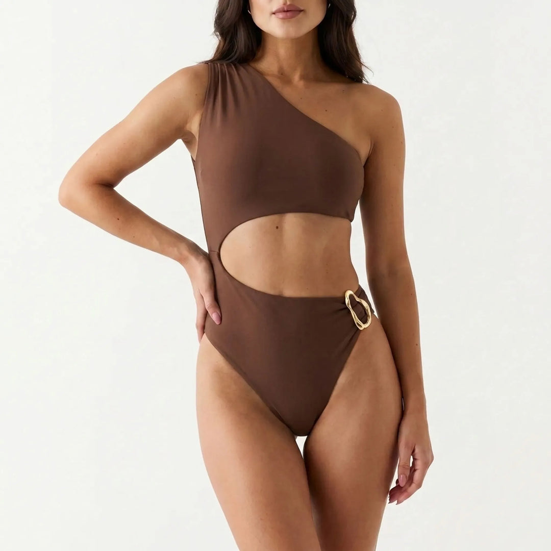 Unique asymmetrical one-shoulder cut-out swimsuit, women's chic beachwear for a standout summer.
