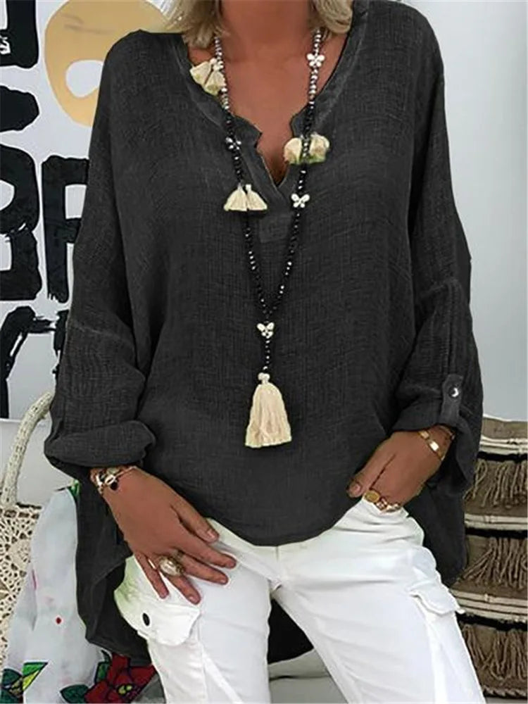 Elegant oversized women's top, a versatile long-sleeve blouse for effortless style on any summer occasion.
