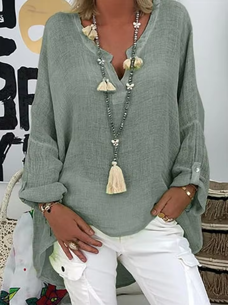 Women's chic oversized long-sleeve blouse, a versatile fashion top for casual elegance and everyday summer wear.