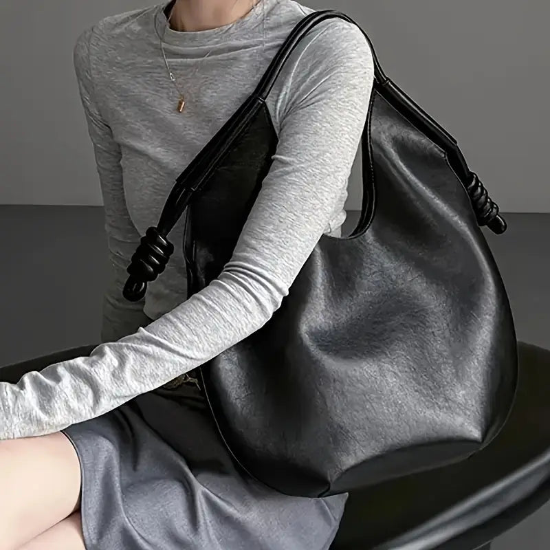 Large women's vegan leather tote bag, a spacious and durable carryall for all essentials.