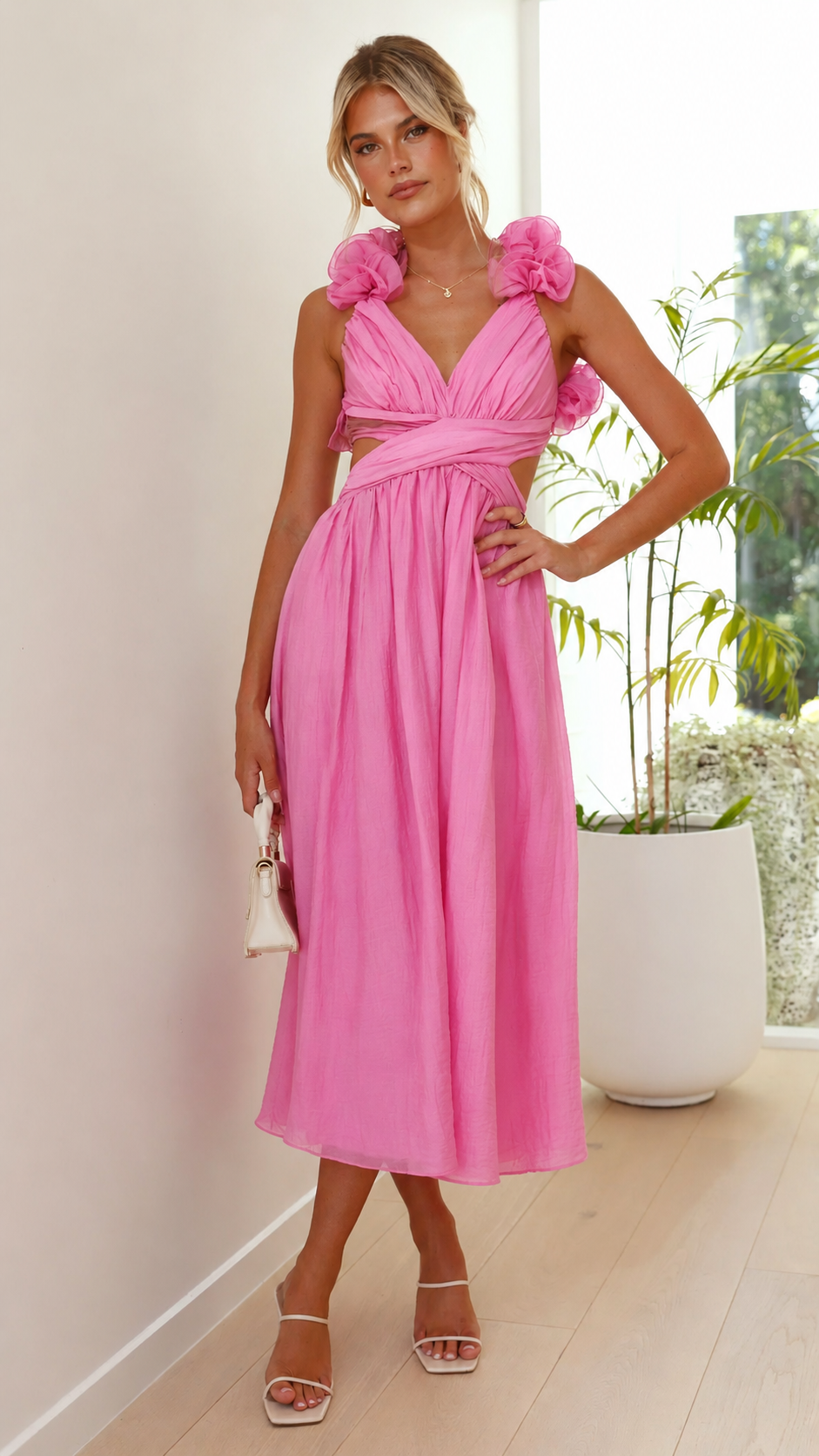 Flowy pink ruffle maxi dress for women, with a chic lace-up back, elegant wedding guest attire.