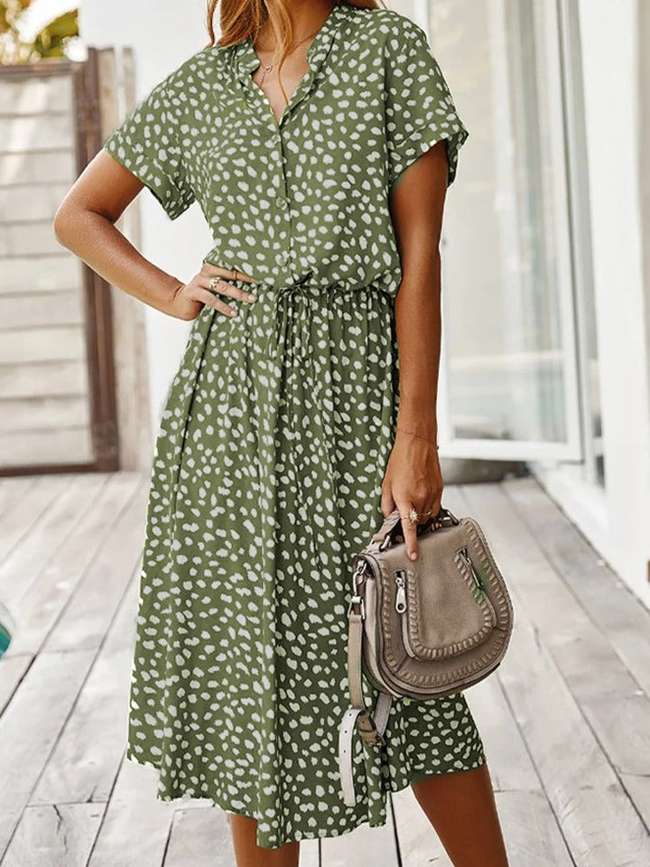 Versatile women's chic printed summer midi dress, short sleeve, ideal for day & vacation fashion.
