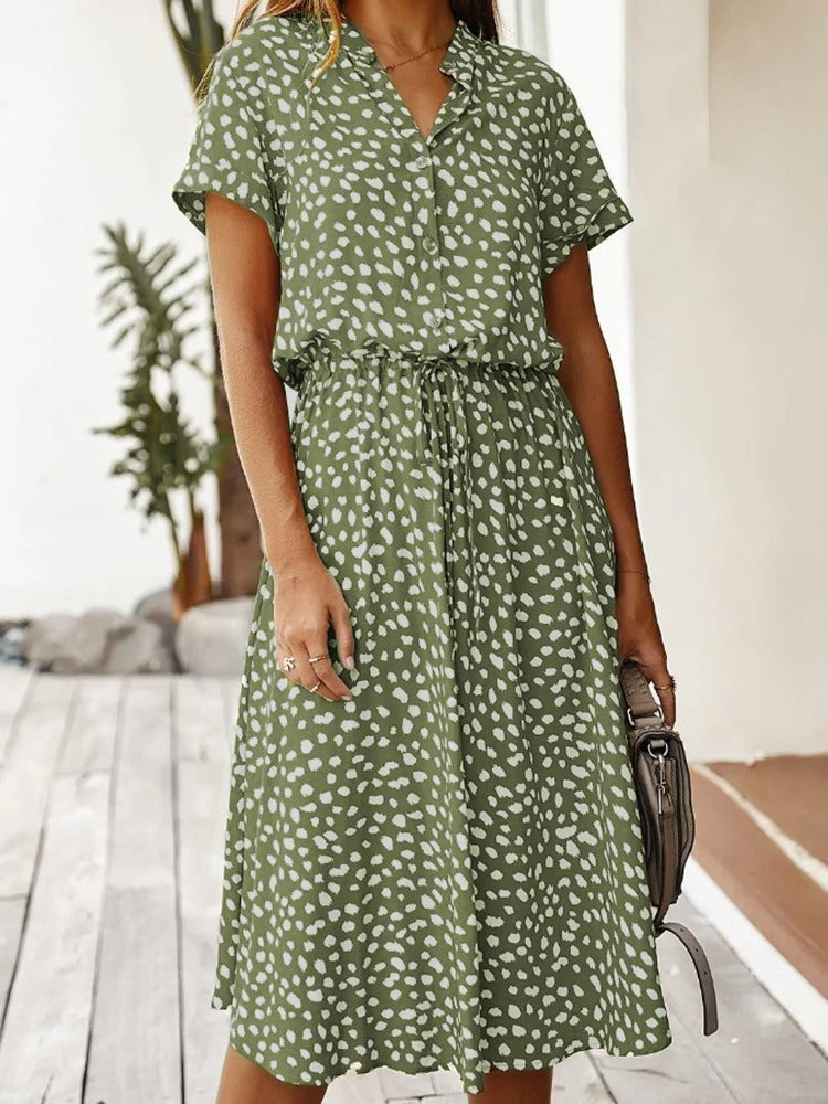 Women's vacation wear: chic printed summer midi dress, comfortable short sleeve day apparel.