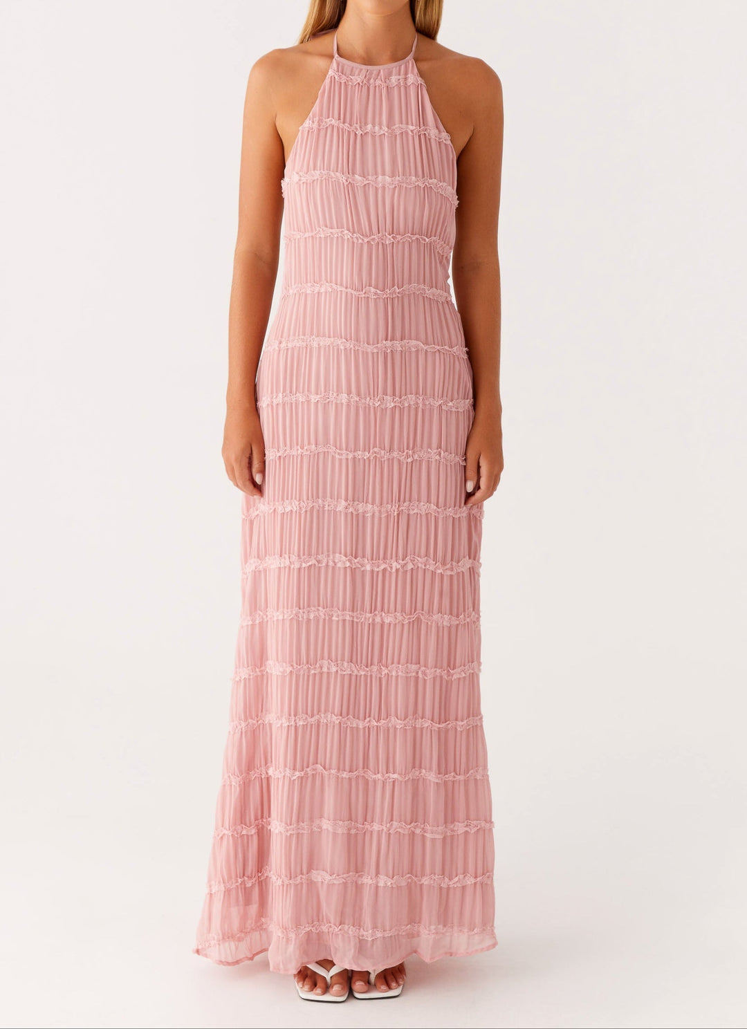 Women's elegant textured maxi dress. A versatile halter neck gown for special occasion and evening events.