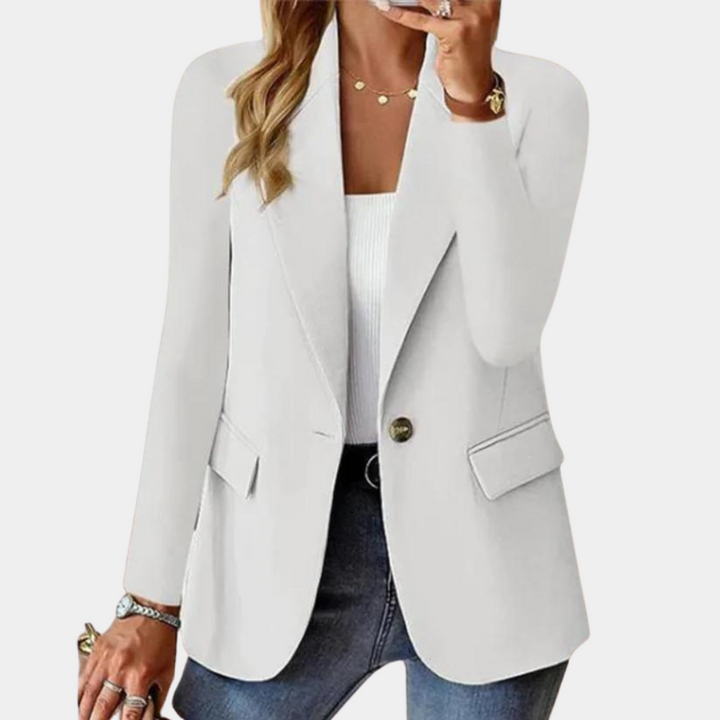 Elegant tailored women's blazer, showcasing a chic silhouette. A stylish and professional layering piece.
