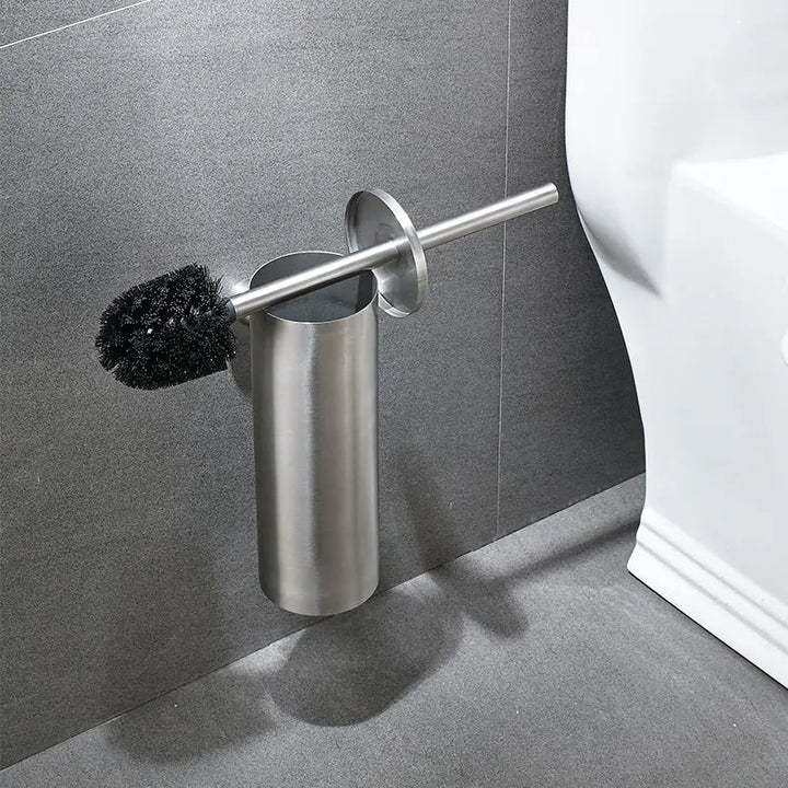 Elegant gold wall-mounted toilet brush, premium bathroom accessory for luxury home organization.