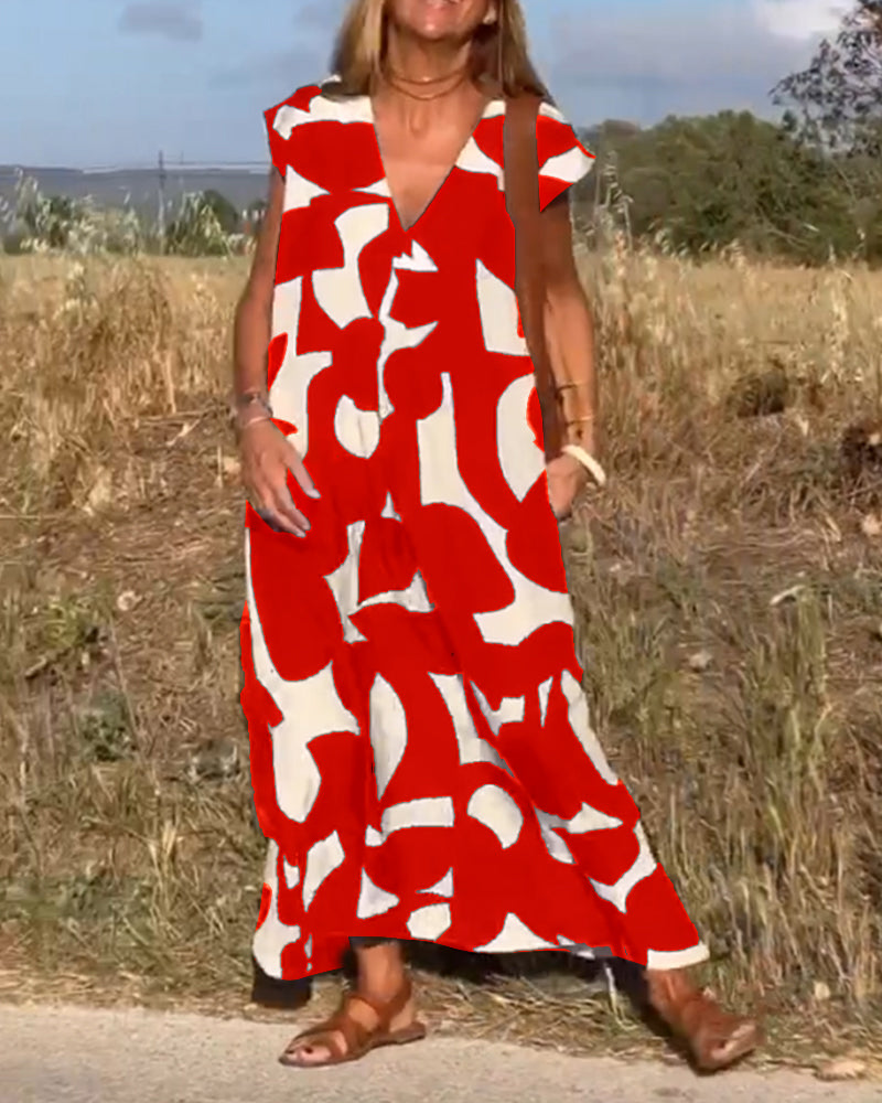 Relaxed women's abstract print summer dress, flowy and comfortable, ideal for chic casual style.