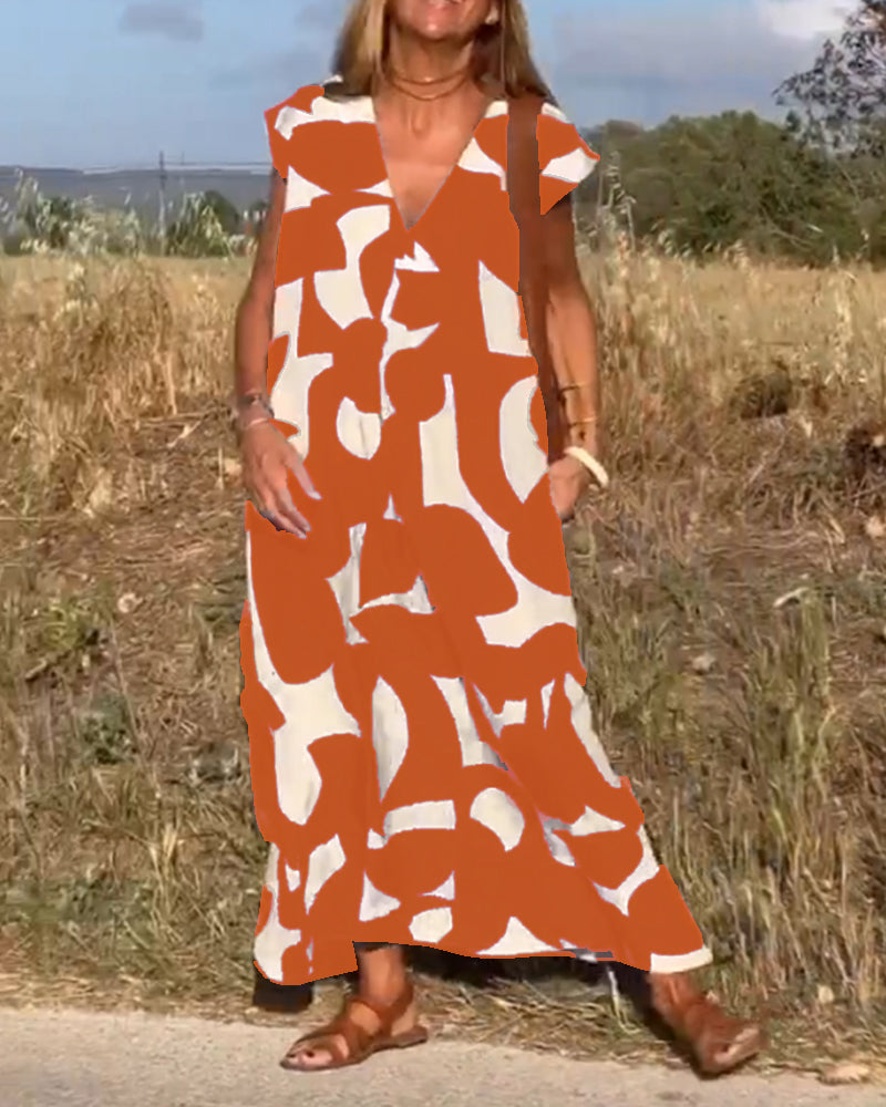 Must-have women's abstract print flowy summer dress, V-neck, cap sleeves; comfortable chic style.