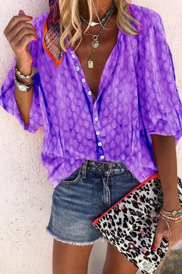 Lightweight women's casual button-front blouse in a chic airy fabric. Perfect for everyday spring/summer style.