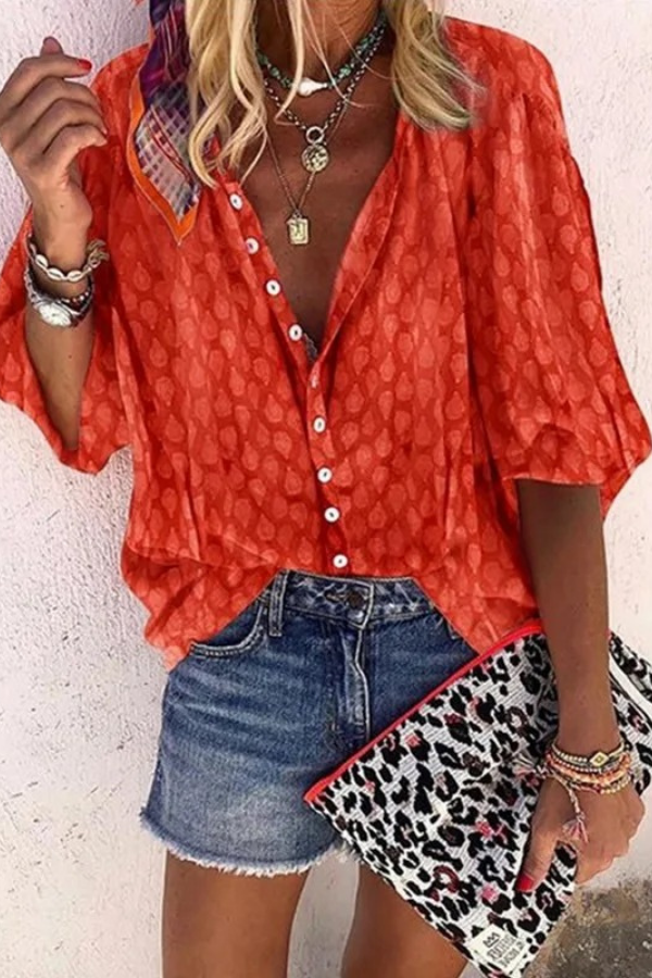 Chic women's airy blouse with button front for spring & summer. Relaxed, lightweight top for versatile styling.